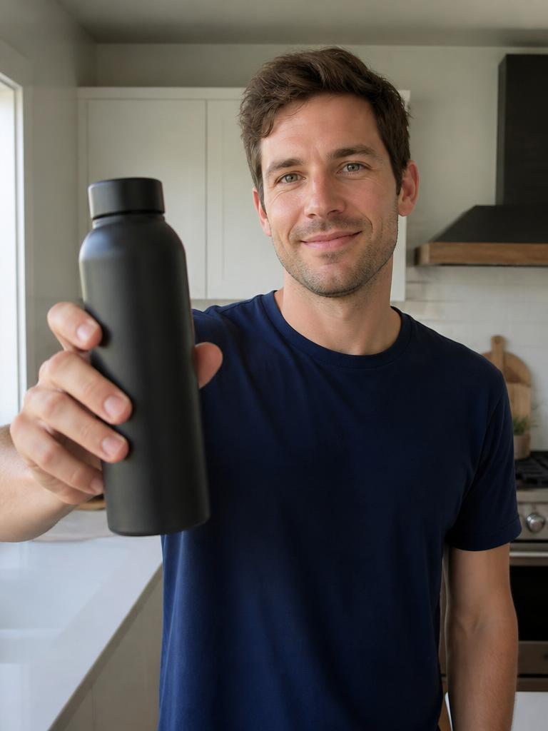 AI Twin example: Unbranded bottle held to camera in a bright kitchen.